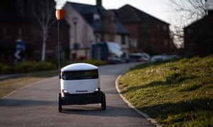 A Starship Technologies delivery robot makes a home delivery in Milton Keynes.